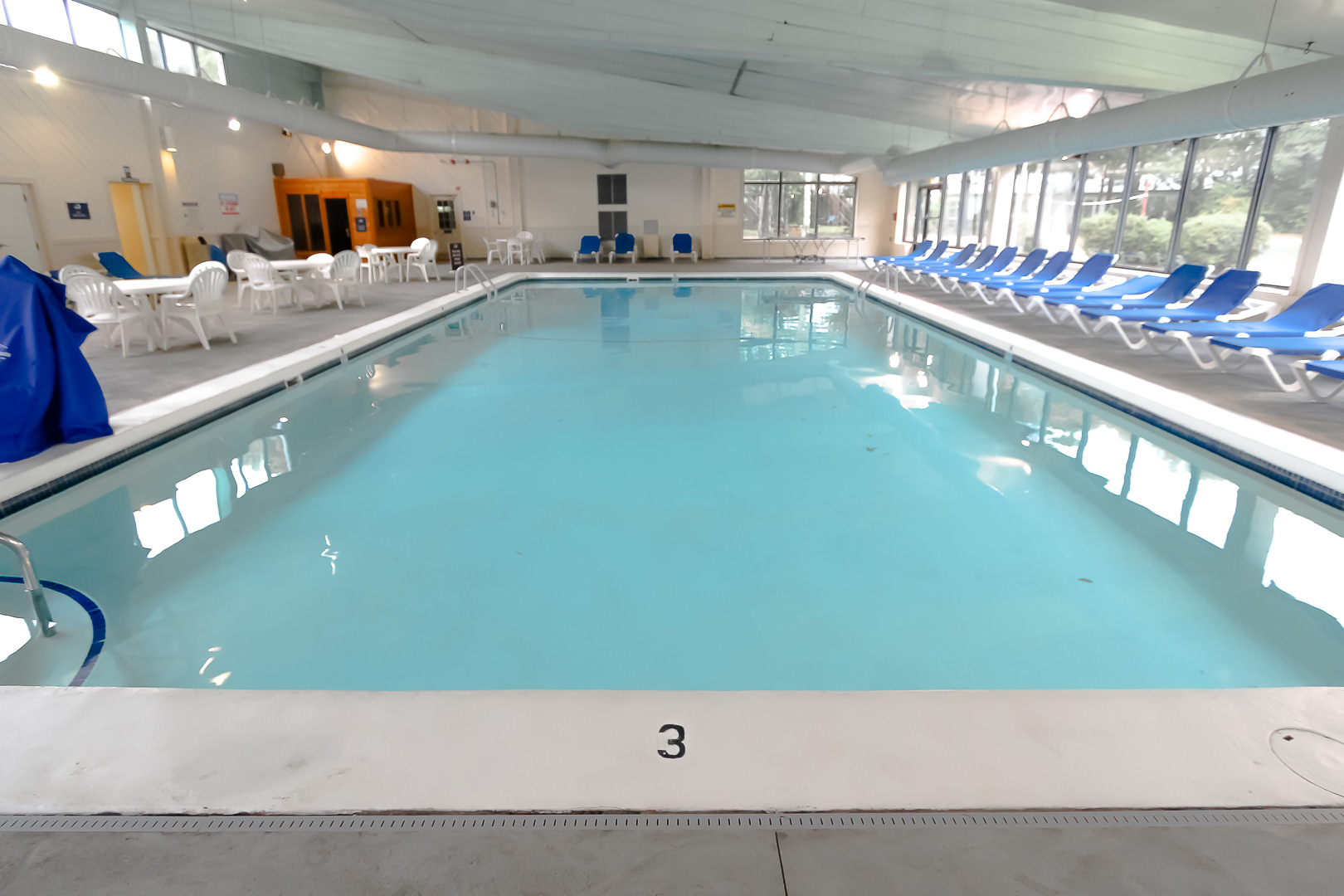 A cozy indoor swimming pool at VRI's Sea Mist Resort in Massachusetts.